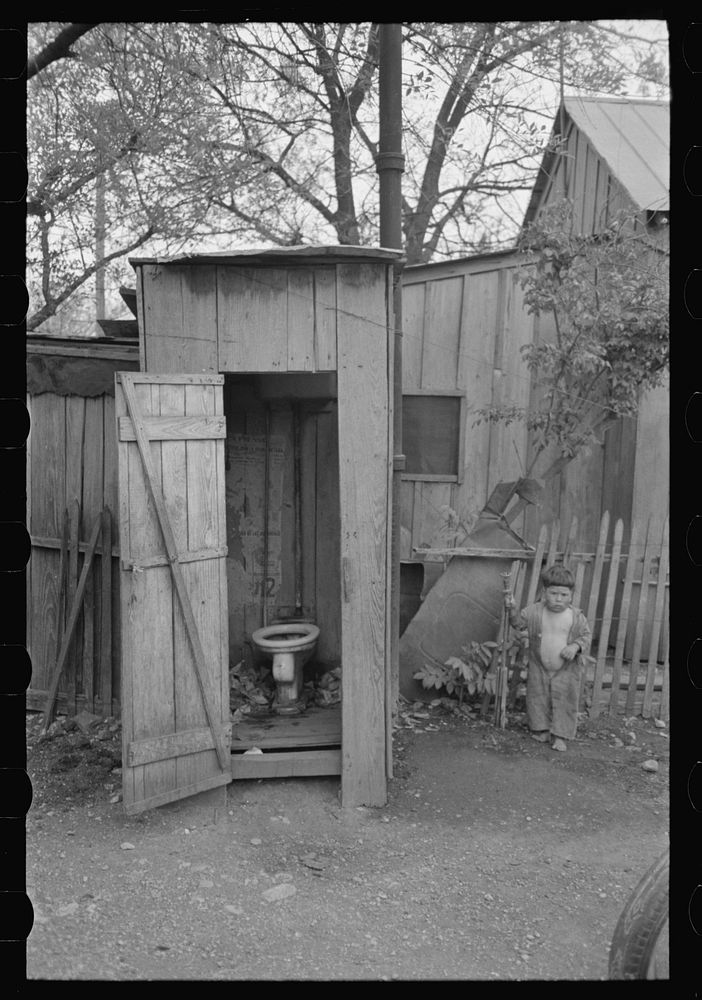 Privy and water supply, Mexican district, San Antonio, Texas by Russell Lee