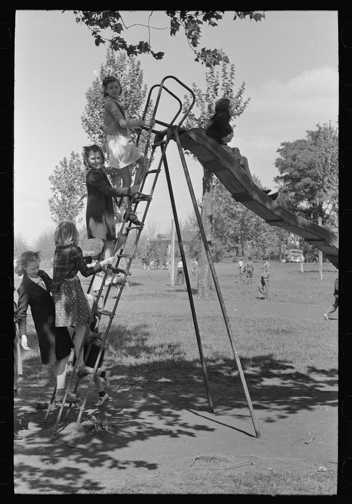 [Untitled photo, possibly related to: Schoolchildren on shoot-the-chute, San Augustine, Texas] by Russell Lee