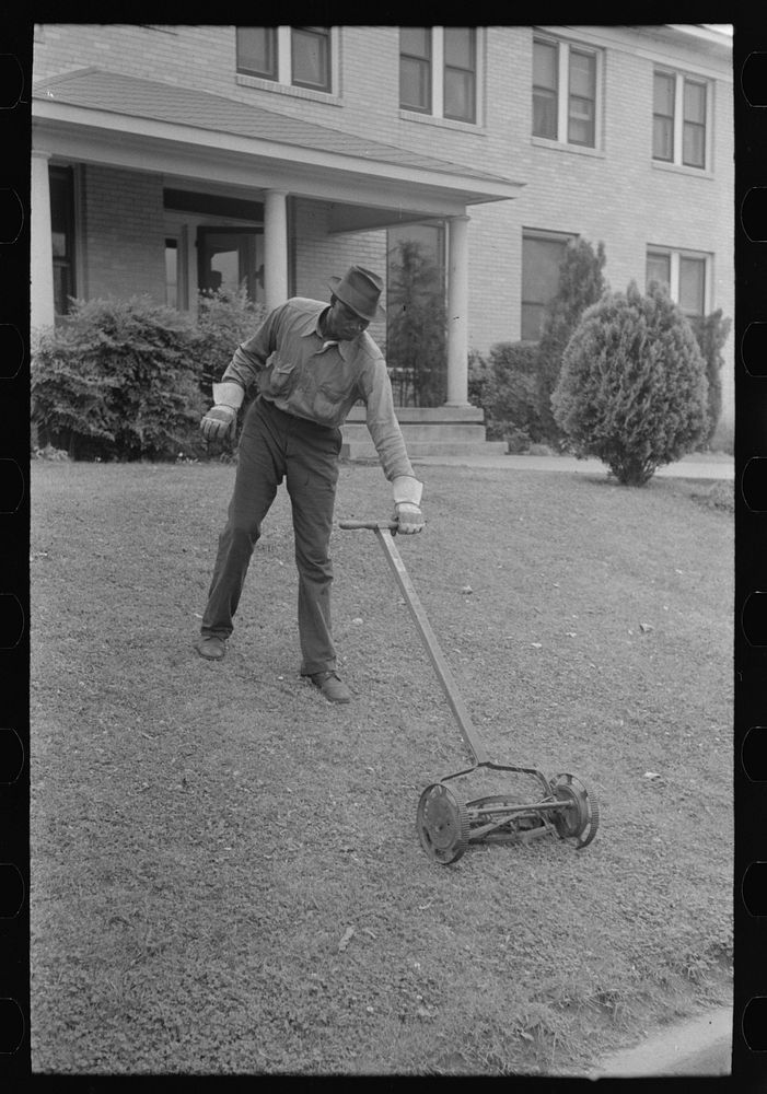 Cutting grass, San Augustine, Texas by Russell Lee