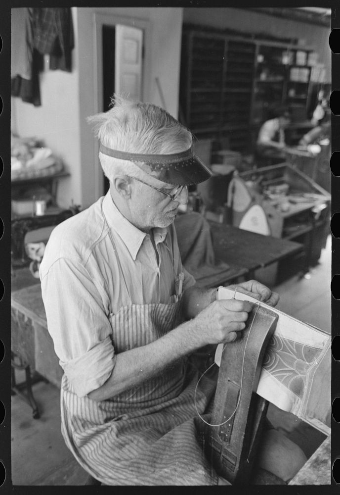 Sewing uppers of boots together in bootmaking shop, Alpine, Texas by Russell Lee