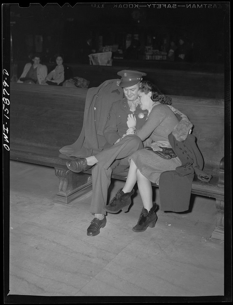 Chicago, Illinois. Soldier and girl waiting for a train in the waiting room of the Union Station. Sourced from the Library…