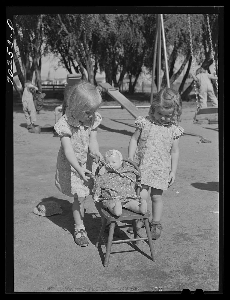 Children playing at the nursery school at the FSA (Farm Security Administration) farm family migratory labor camp. Yakima…