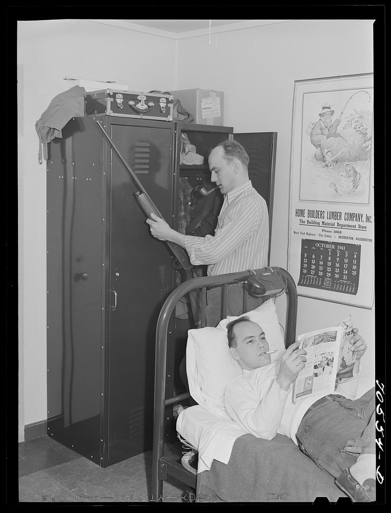 Workmen at the Navy shipyards in their room at the FSA (Farm Security Administration) dormitories. Bremerton, Washington by…