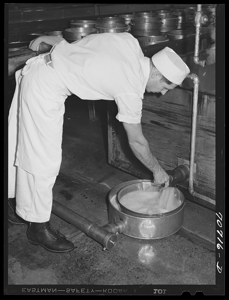 "[Untitled photo, possibly related to:  Draining off the whey in making cheese at the Tillamook cheese plant. Tillamook…