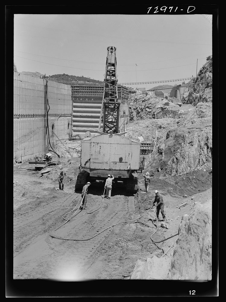 Shasta Dam, Shasta County, California. Moving a steam shovel by Russell Lee