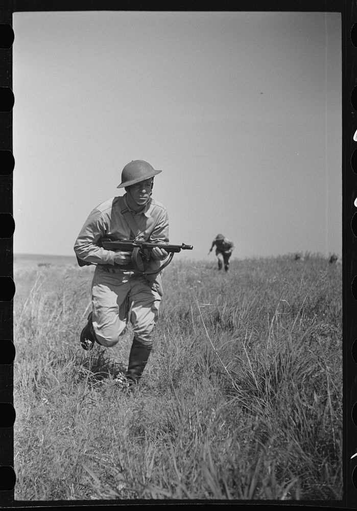 Fort Riley, Kansas. Soldiers of a mechanized reconnaissance unit during a simulated dismounted attack. Sourced from the…