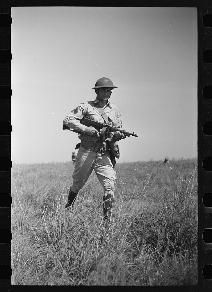 Fort Riley, Kansas. Soldiers of a mechanized reconnaissance unit during a simulated dismounted attack. Sourced from the…