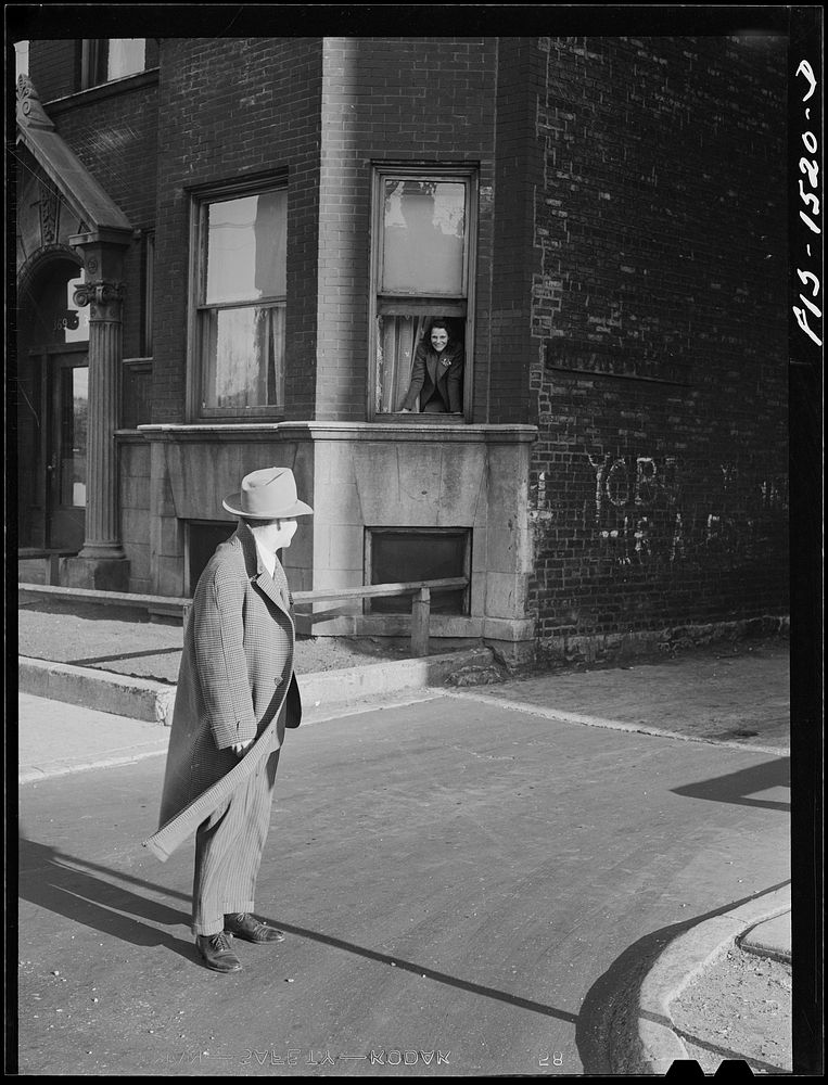 On his way to play at an afternoon show "Red" Sounders [i.e. Saunders] stops to say goodbye to his wife. Chicago, Illinois.…