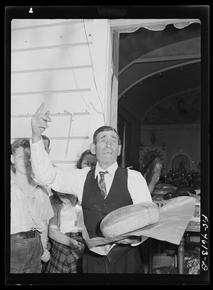 Auctioneer at the fiesta of the Holy Ghost. Santa Clara, California by Russell Lee