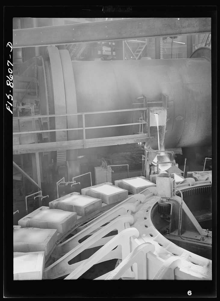Amaconda smelter, Montana. Anaconda Copper Mining Company. Pouring copper anodes from the refining furnace; product at this…