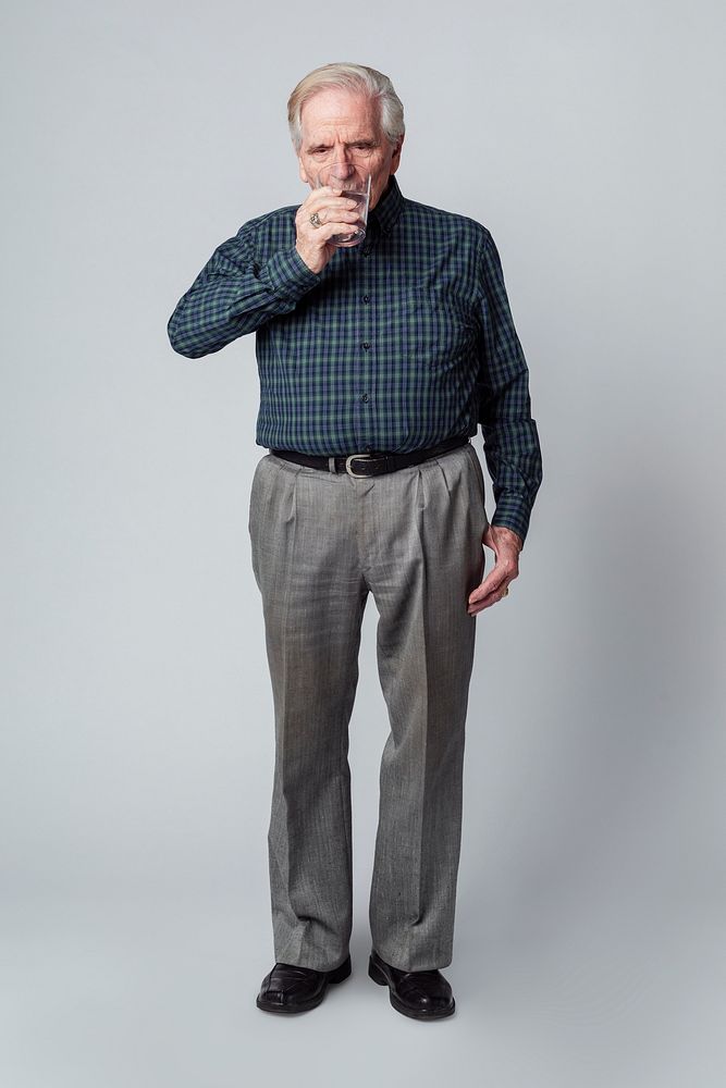 Senior man drinking a glass of water