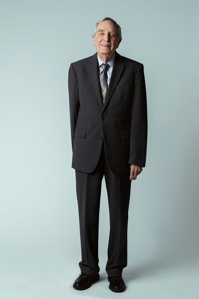 Happy senior businessman in a suit 
