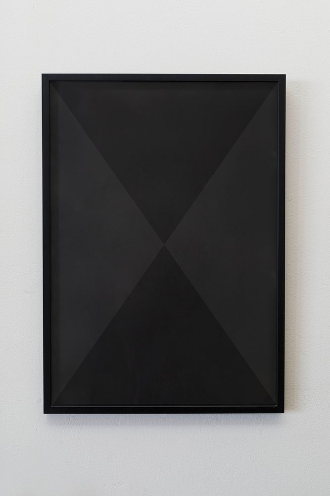 Black frame against a gray wall