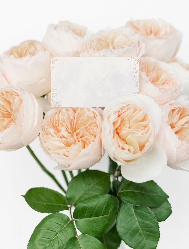 Card mockup on a bouquet of orange roses