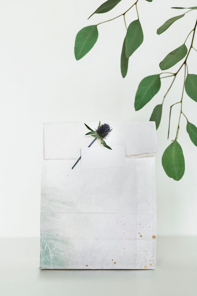 Grunge white paper bag with alpine sea holly