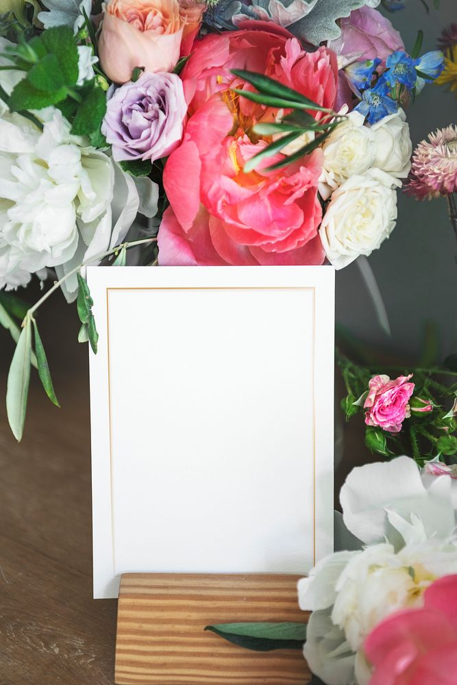 Bouquet of colorful flowers with a white card mockup