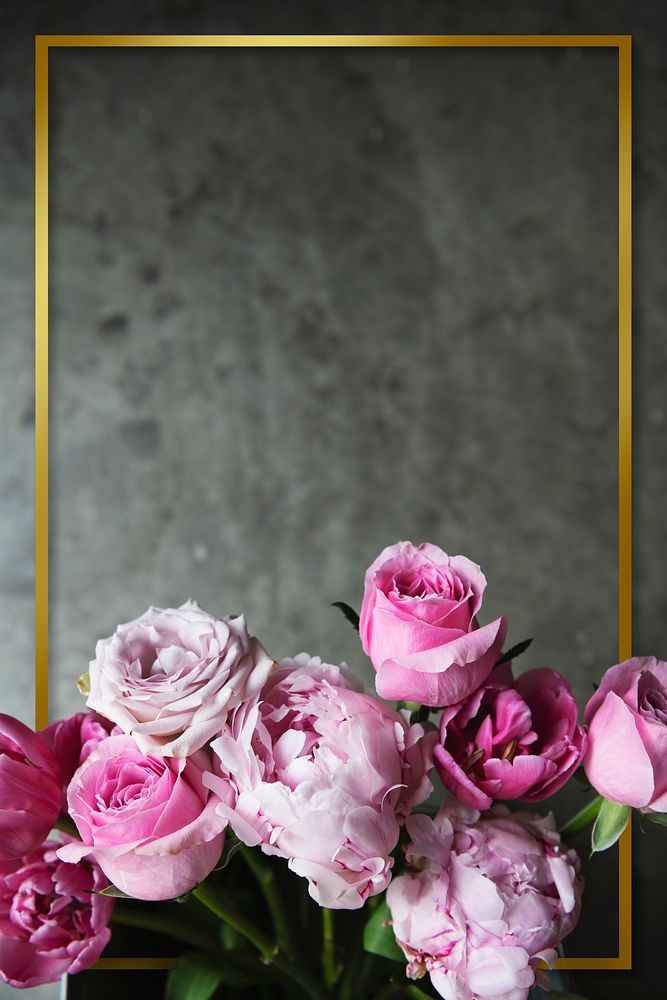 Golden frame with blooming ranunculus roses