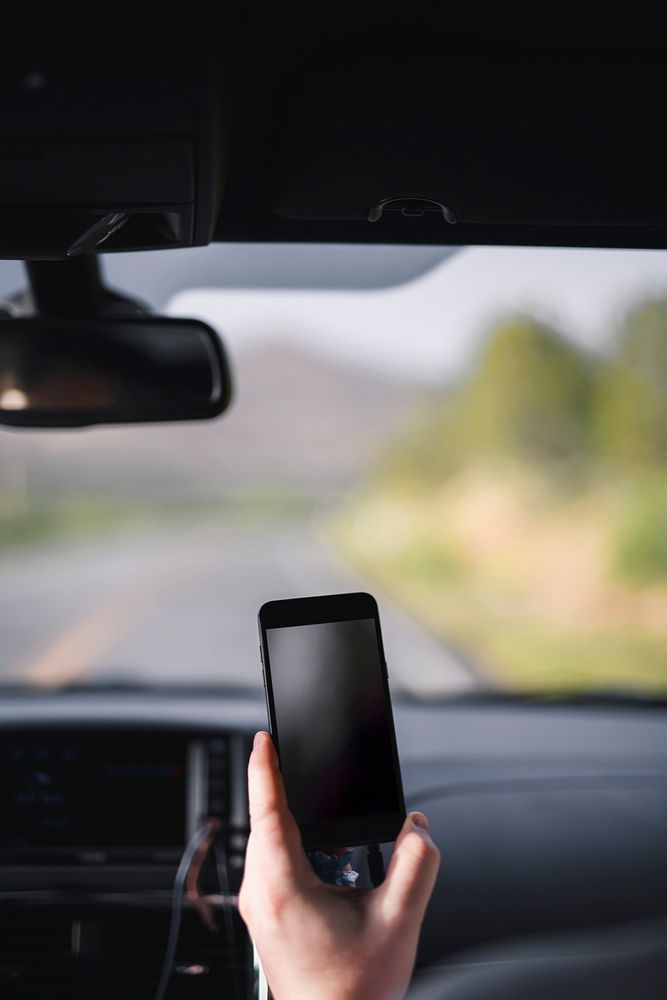 Phone mockup inside a car