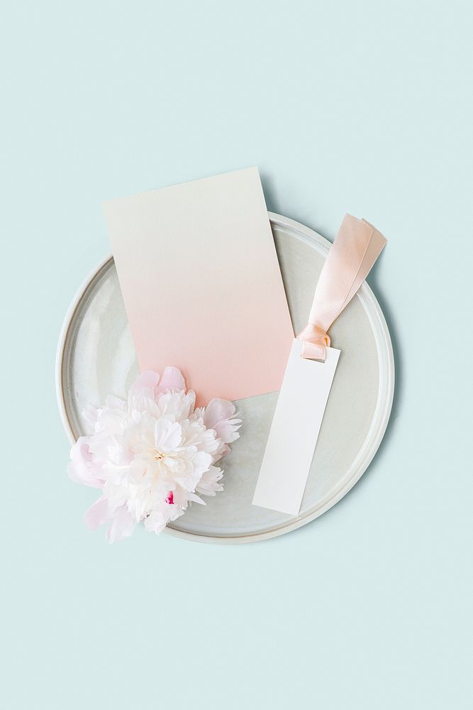 Blank floral label mockup on a plate