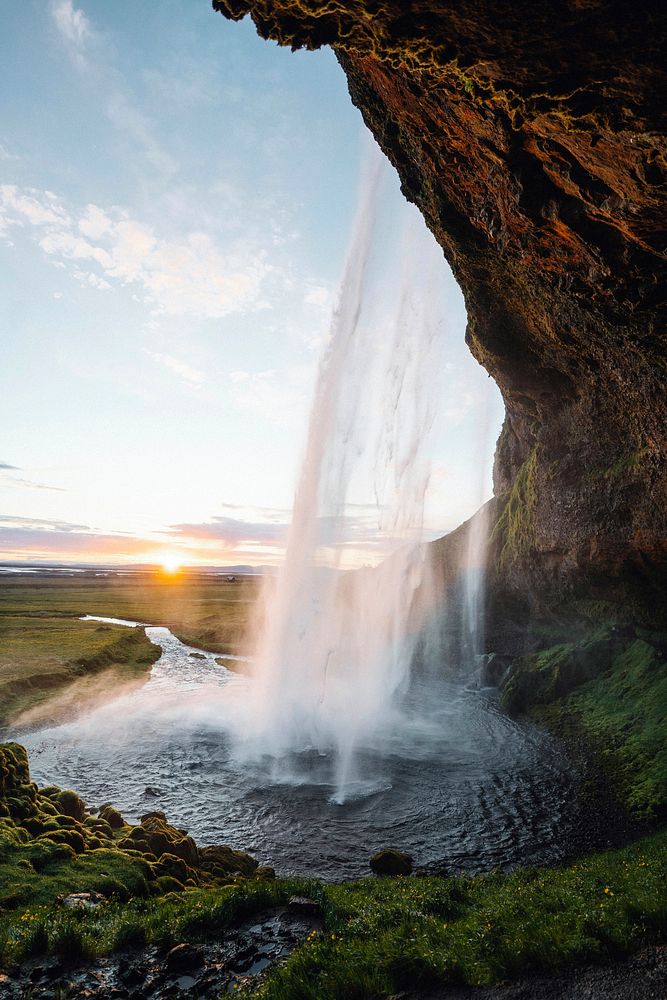 Back view of Seljalandsfoss waterfall in Iceland