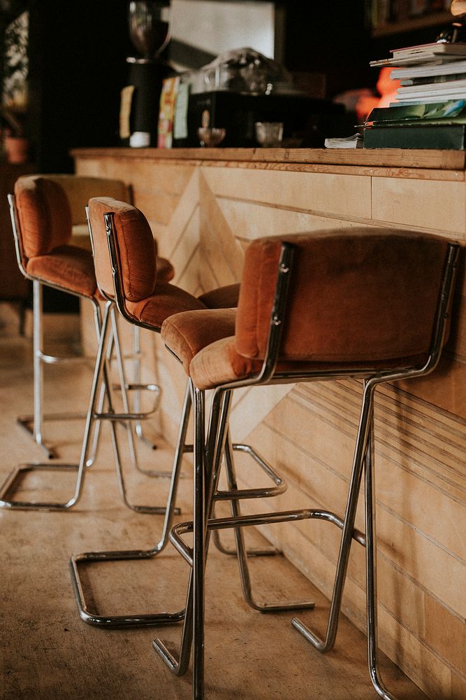 Brown soft stools in a cafe