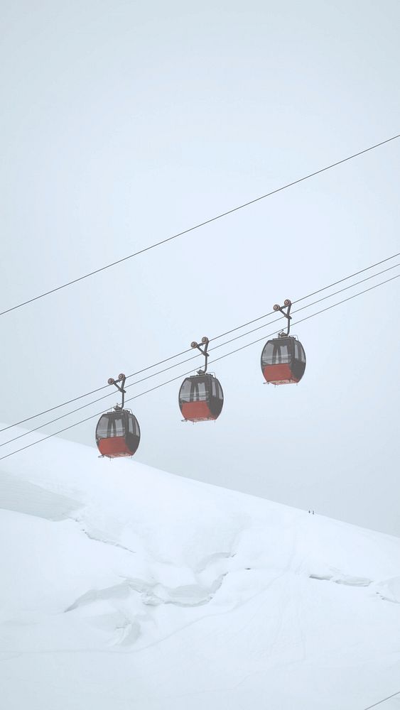 Cable car passing through the French Alps mobile phone wallpaper