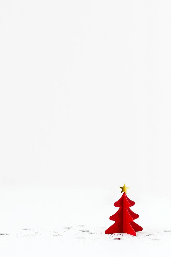 Festive red Christmas tree decor on a white background