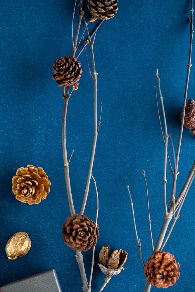 Golden pinecones on a branch