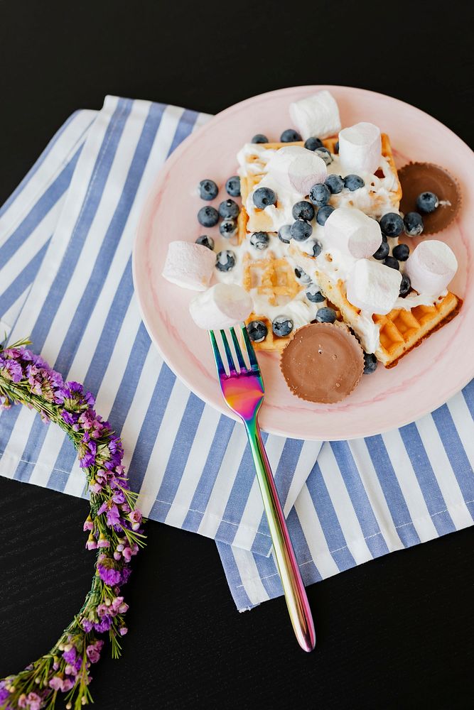 Blueberry and marshmallows over crispy extra everything waffles