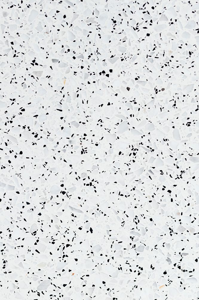 White granite textured tile with black stains