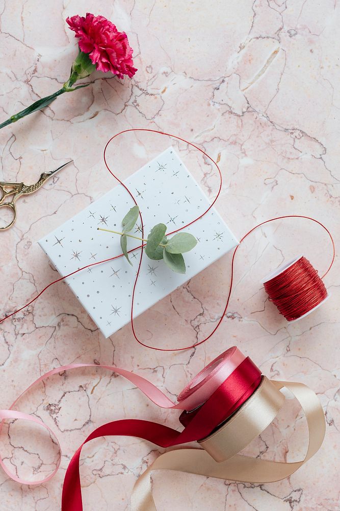 Valentine's surprise gift on a pink marble table