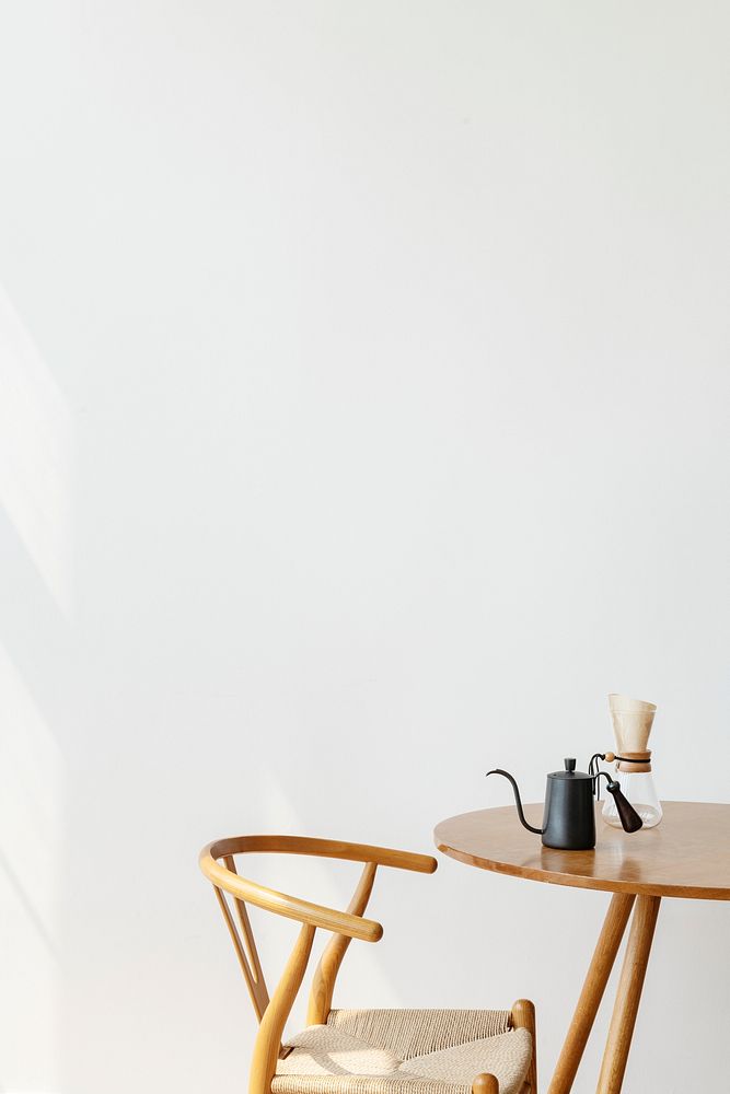 Pour over coffee maker on a Scandinavian breakfast nook in a white room