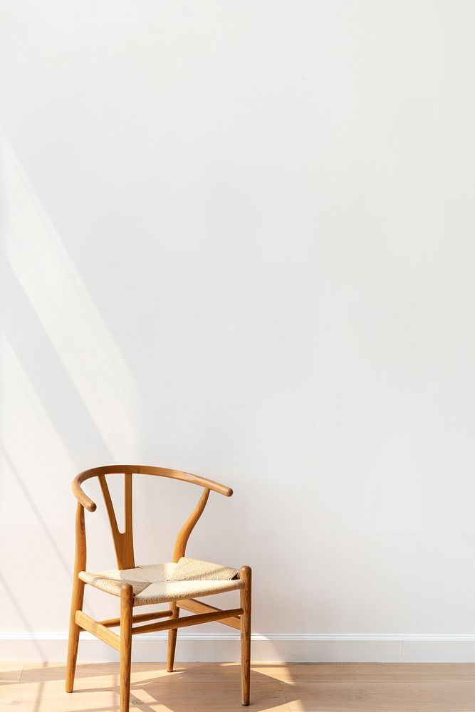 Classic wooden chair in a white room