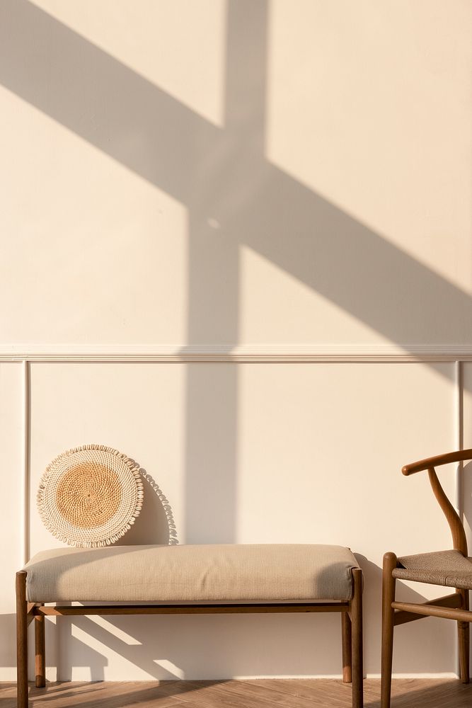 Late afternoon light on a beige wall