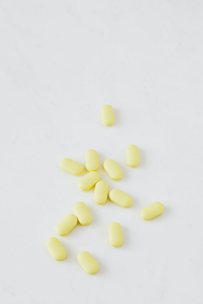 Yellow antibiotics on a white background