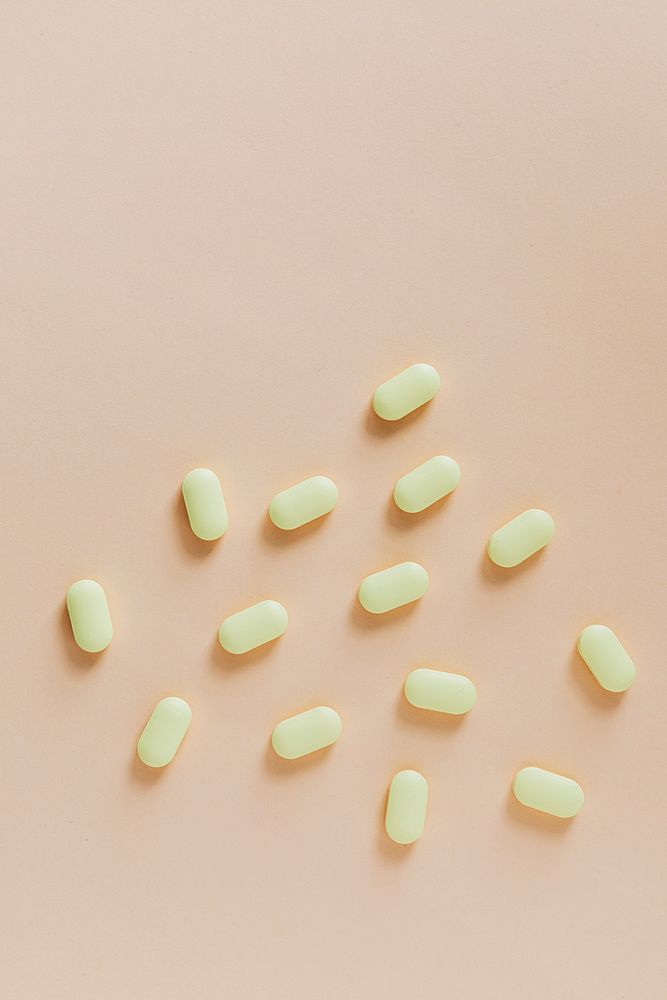 Yellow antibiotics on a beige background 