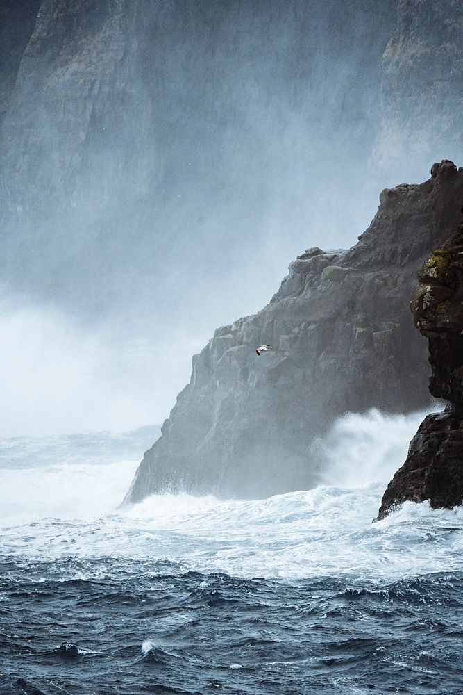 Stormy waves hitting the cliffs at Molin beach in Streymoy island, Faroe Islands