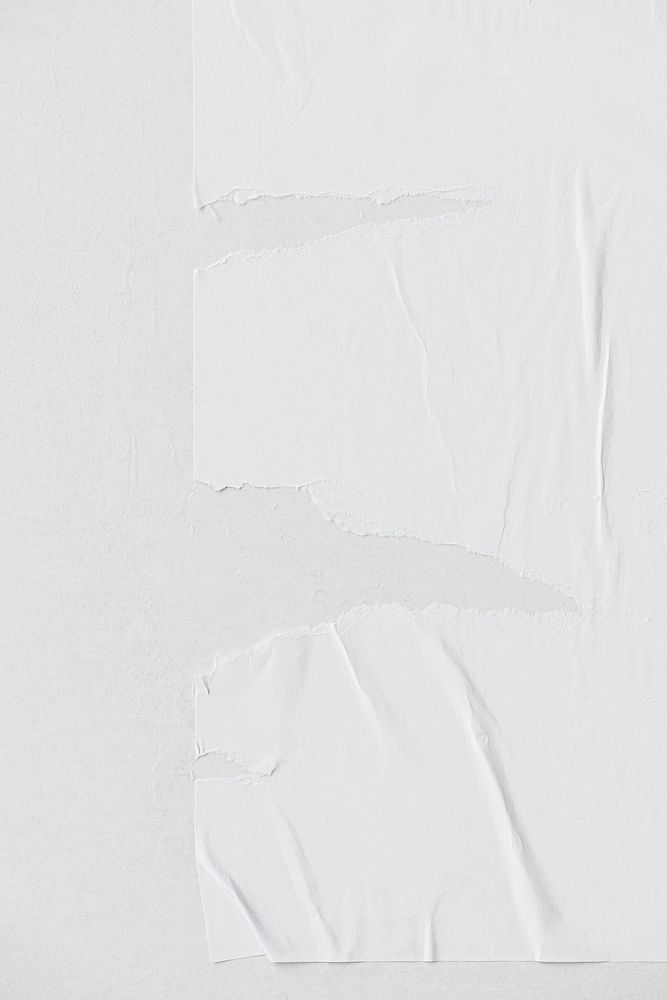 White torn paper mockup on the wall
