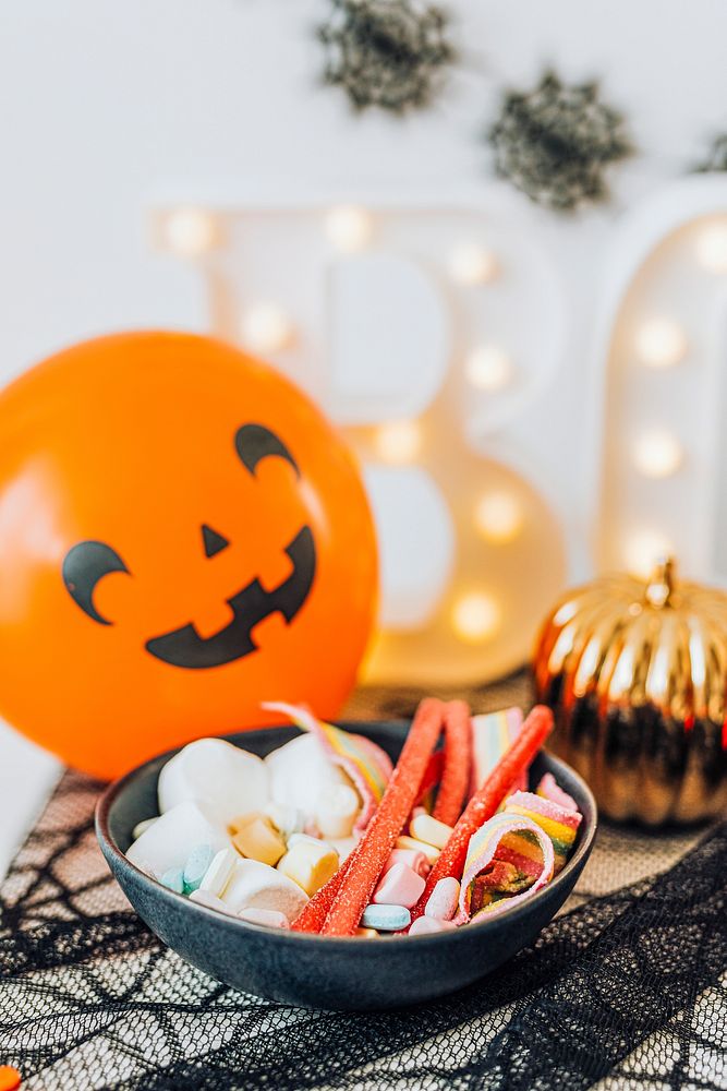 Halloween decoration with a bowl full of sugar candies 