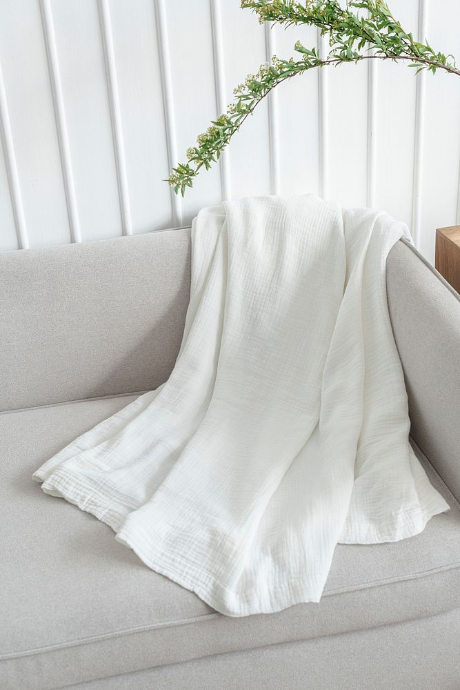 White throw blanket on a sofa