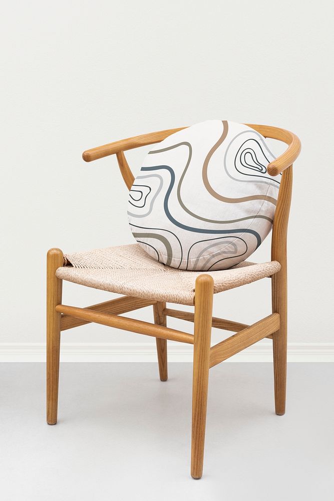 Vintage linen cushion cover mockup psd on an armchair