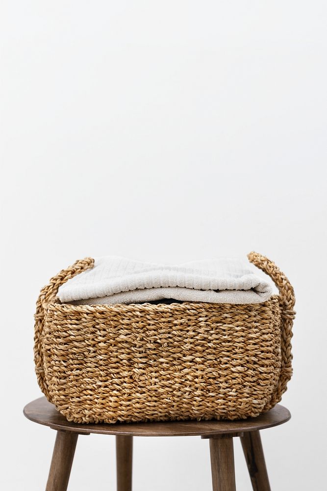 Weaved laundry basket on a chair