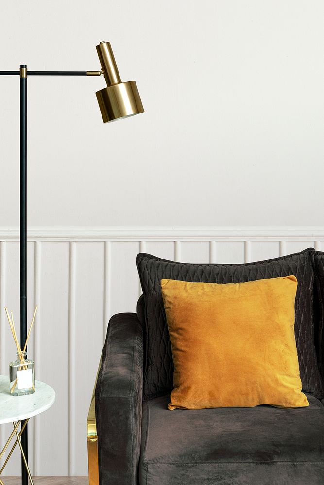 Plain mustard cushion on a sofa minimal interior design