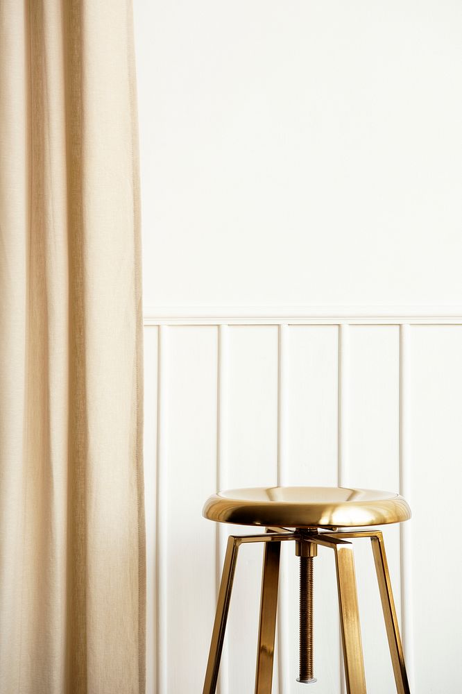 White wall with golden stool and curtain luxury interior