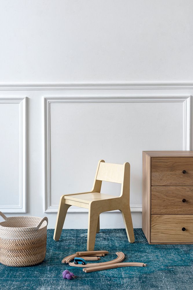 Wooden furniture and toys in a kids play room