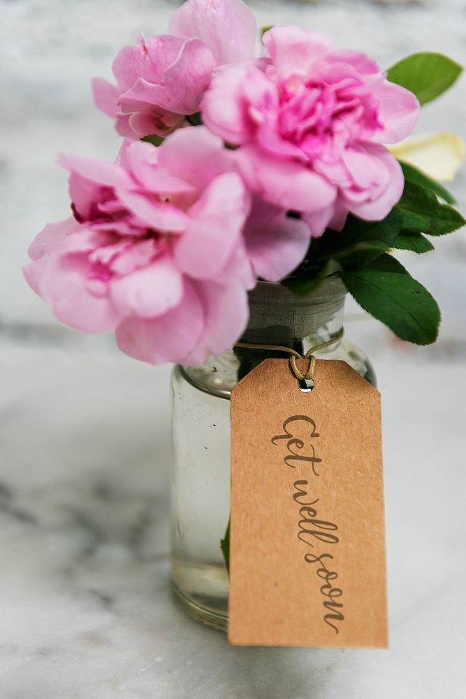 Pink flower with wishing label