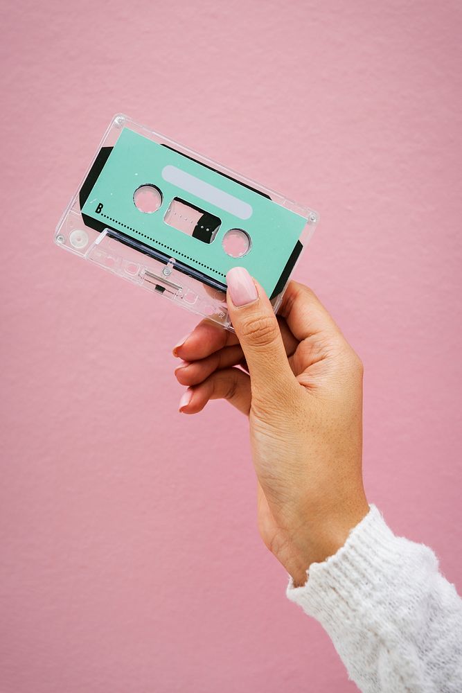 Closeup of hand holding design space cassette tape