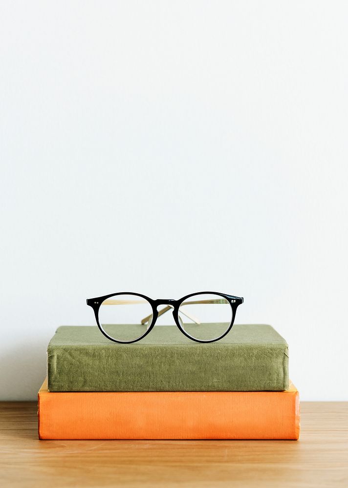 Two books and a pair of glasses