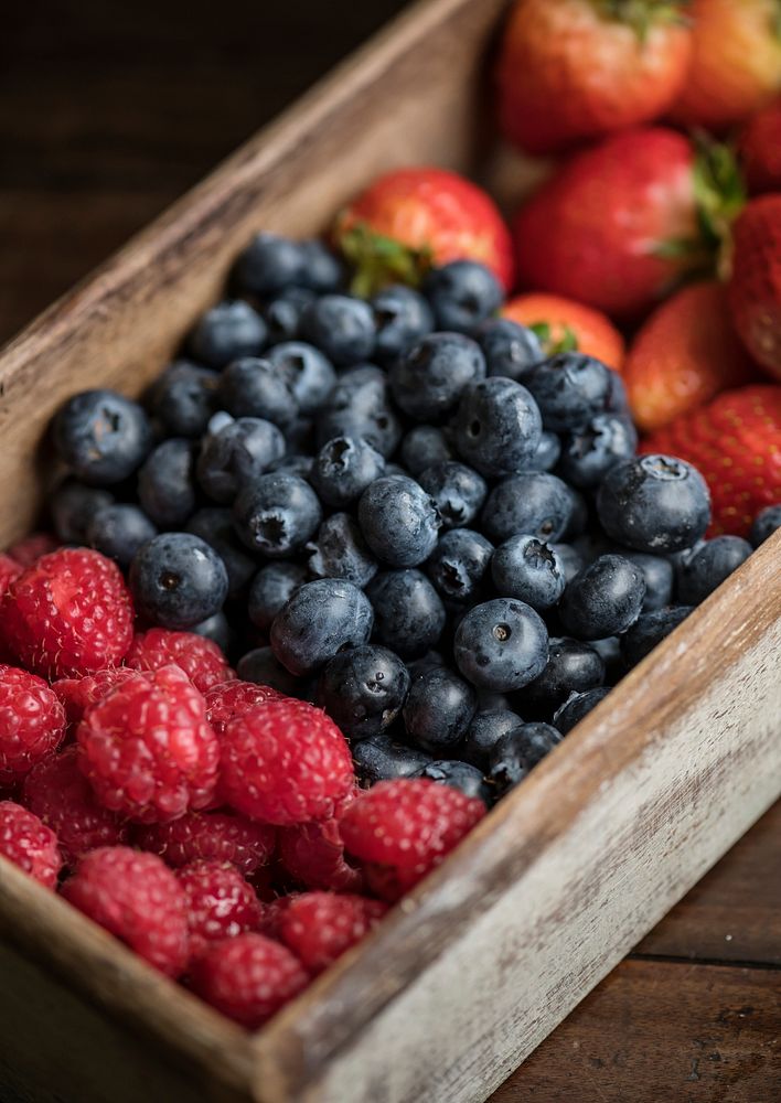 Closeup of fresh bluberries and raspberries