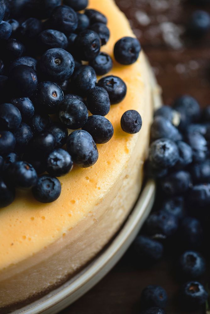 Closeup of a cheesecake decorated with blueberries
